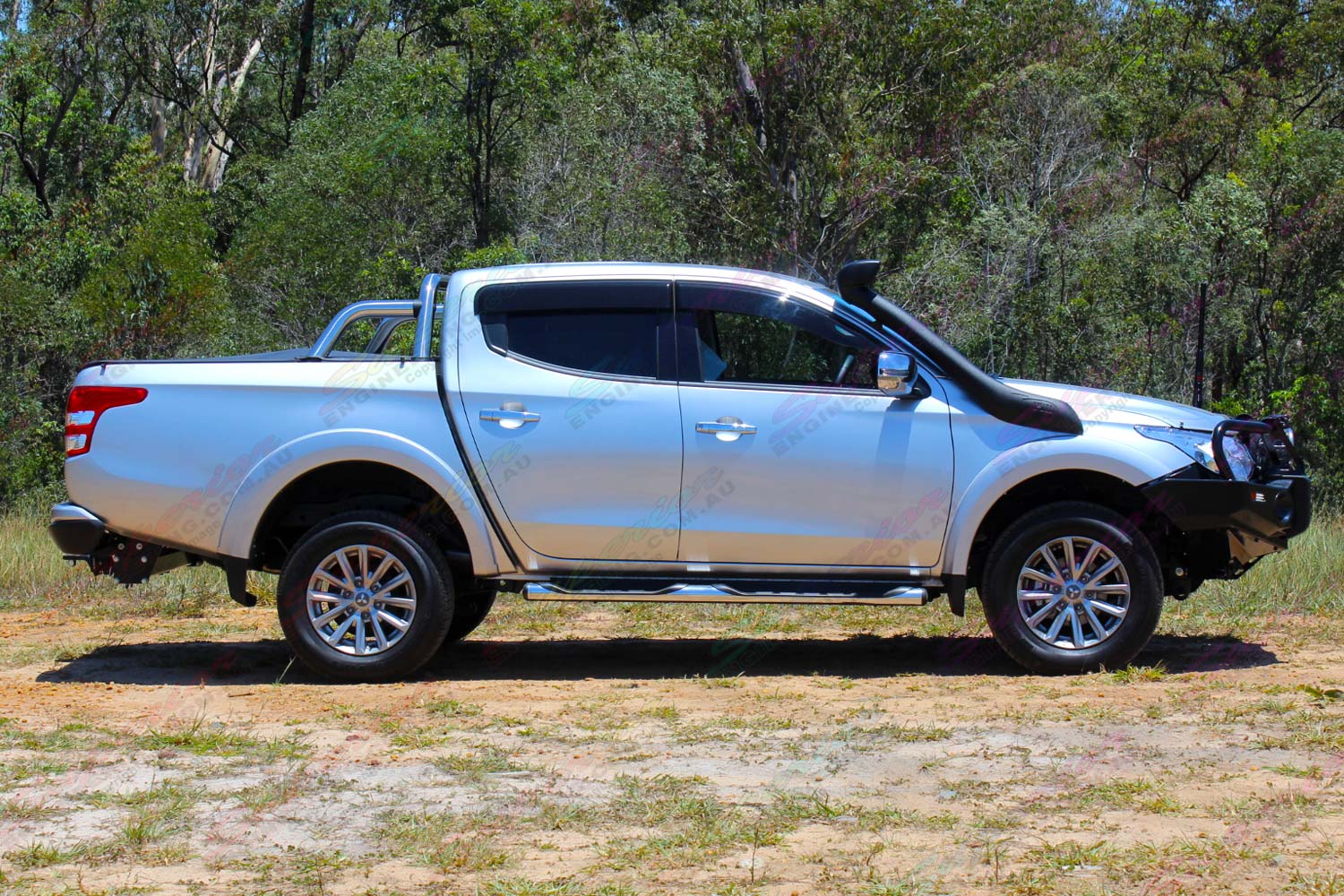 Mitsubishi Triton MQ Silver Dual Cab - Side View - Fitted with the Ironman Bullbar and TJM Snorkel