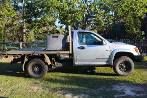 Right side view of a Silver RC Holden Colorado single cab fitted with a 45mm Tough Dog lift kit