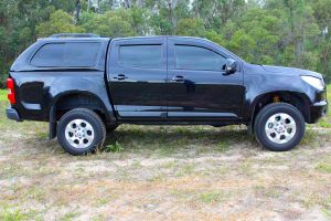Right side profile view of the RG Holden Colorado dual cab fitted with an Ironman 4x4 2" Inch Lift Kit