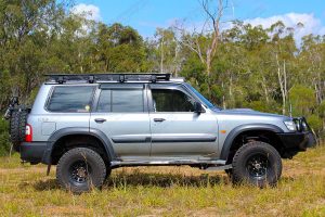 Right side view of a Silver GU Nissan Patrol Wagon fitted with a 3" Inch Superior Remote Reservoir Superflex Lift Kit