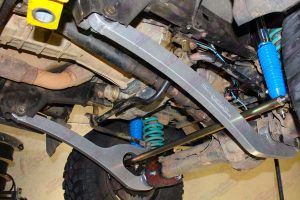 Closeup view of the Superior superflex radius arms, shocks and tierod fitted to the 76 series Toyota Landcruiser
