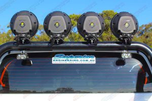 Closeup view of the back of some Lightforce HID LEDs mounted to the Ironman 4x4 sportsbar fitted on a current model Toyota Hilux Revo