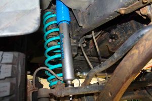 Closeup view of a Superior nitro gas shock and coil spring fitted to the 100 Series Toyota Landcruiser 4wd