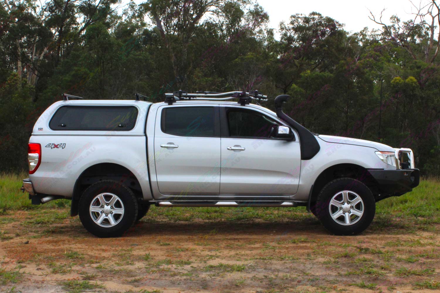 Right side view of a Silver PX Ford Ranger fitted with a range of Superior and Ironman 4x4 accessories