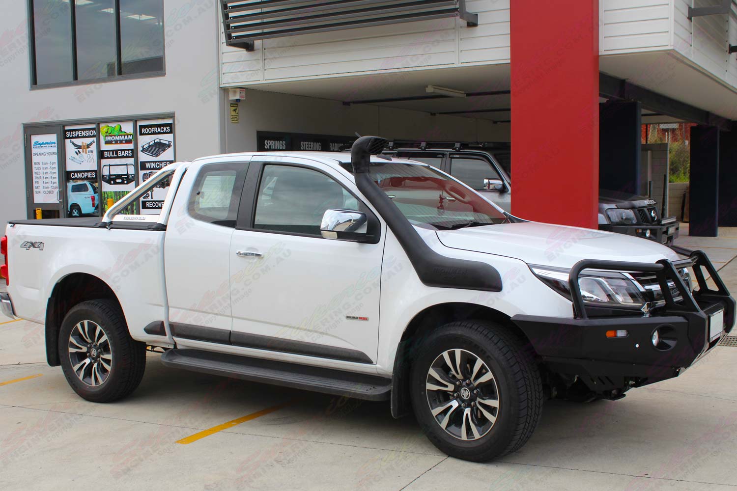Right side view of a Holden Colorado Space Cab fitted with a new Ironman 4x4 Bullbar and Airforce Snorkel