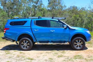 Right side view of the MQ Mitsubishi Triton (dual cab) fitted out with a 40mm Superior Nitro Gas lift kit