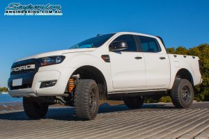 Left side view of the PX Ford Ranger (dual cab) after fitted with a 3 inch Superior Nitro Gas lift kit at the Superior Engineering Burpengary workshop