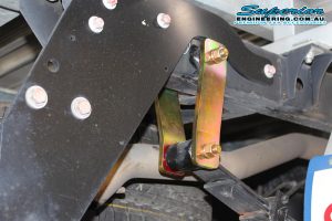 A Superior extended greaseable shackle fitted to the rear leaf spring on the Ford Ranger PX11 (Extra Cab) on the hoist at the Superior Engineering Deception Bay 4wd workshop
