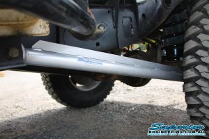 Closeup view of a single heavy duty custom length Superior Long Arm fitted to the underside on the GU Nissan Patrol Ute