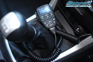 Closeup view of the GME Two Way radio installed to the dual cab Isuzu D-Max at the Superior Engineering 4wd workshop and hoist