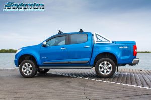 Left side view of a blue Holden Colorado RG Dual Cab fitted with a 4 Inch Premium Superior Engineering lift kit at the Burpengary boat ramp