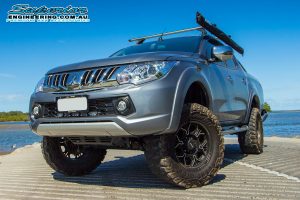 Front left view of a MQ Mitsubishi Triton fitted with some Premium Superior Remote Reservoir Shocks and Struts at the Caboolture river boat ramp