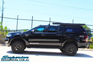 Left side view of a Black Ford PX Ranger Dual Cab after fitting a 2" inch lift with EFS Coil & Leaf Springs with Bilstein Rear Shock & Front Strut