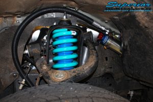 Right front inside view of the Dobinson Coil Spring and Superior Remote Reservoir Strut