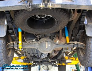 Rear underbody view of the fitted Bilstein Shocks + EFS Leaf Springs