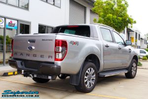 Rear right view of a Grey Ford PX2 Ranger before fitment of a Superior Nitro Gas 4" Inch Lift Kit + Superior Diff Drop Kit