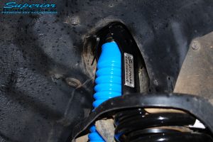 Front right inside guard view of the fitted 4" Nitro Gas Shock with Coil Spring
