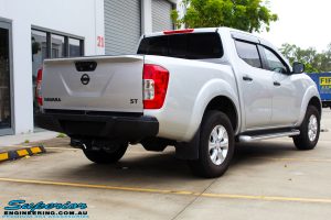 Rear right view of a Grey Nissan NP300 Navara Ute before fitment of a Superior Nitro Gas 2" Inch Lift Kit + Airbag Man 2" Coil Air Kit Helper, Ironman 4x4 Flomax Air Compressor and Nitto Trail Grappler Tyres with King Gator Wheels