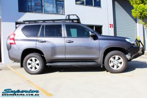Right side view of a Grey Toyota 150 Series Landcruiser Prado before fitment of a Superior Nitro Gas 2" Lift