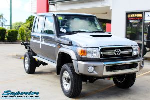 Right front side view of a Grey Toyota 79 Series Landcruiser after fitment of a Superior Nitro Gas Superflex 4" Inch Lift Kit