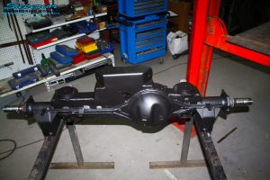 Rear axle housing after fitment of bottom shock, control arm mounts and spring perches also removal of tabs.