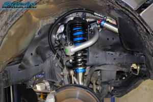 Right front inside view of the fitted Coil Spring with Superior Remote Reservoir Strut & Superior Upper Control Arm