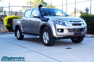 Right front side view of a Silver Isuzu D-Max Dual Cab before fitment of a Superior Nitro Gas 2" Inch Lift Kit + MCC Rocker Bull Bar + Rear Bar & a Superior Diff Drop Kit