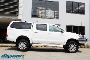Right side view of a Toyota Vigo Hilux Dual Cab after fitment of a Superior Remote Reservoir 2" Inch Lift Kit