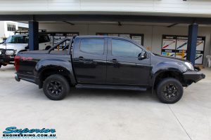 Side right view of a Black Isuzu D-Max Dual Cab before fitment of a Dobinson 40mm Lift Kit