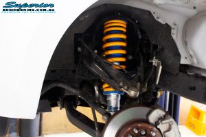 Front right inside guard view of the fitted Superior 2" Nitro Gas Strut + Coil Spring