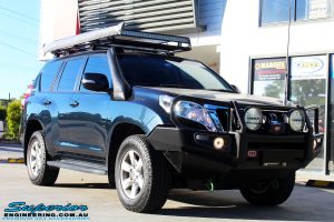 Right front side view of a Toyota 150 Landcruiser Prado in Blue before fitment of a 2" Inch Lift Kit