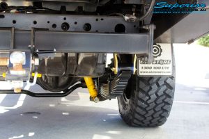 Rear right underbody view of the fitted EFS 2" Inch Leaf Spring + Shackles