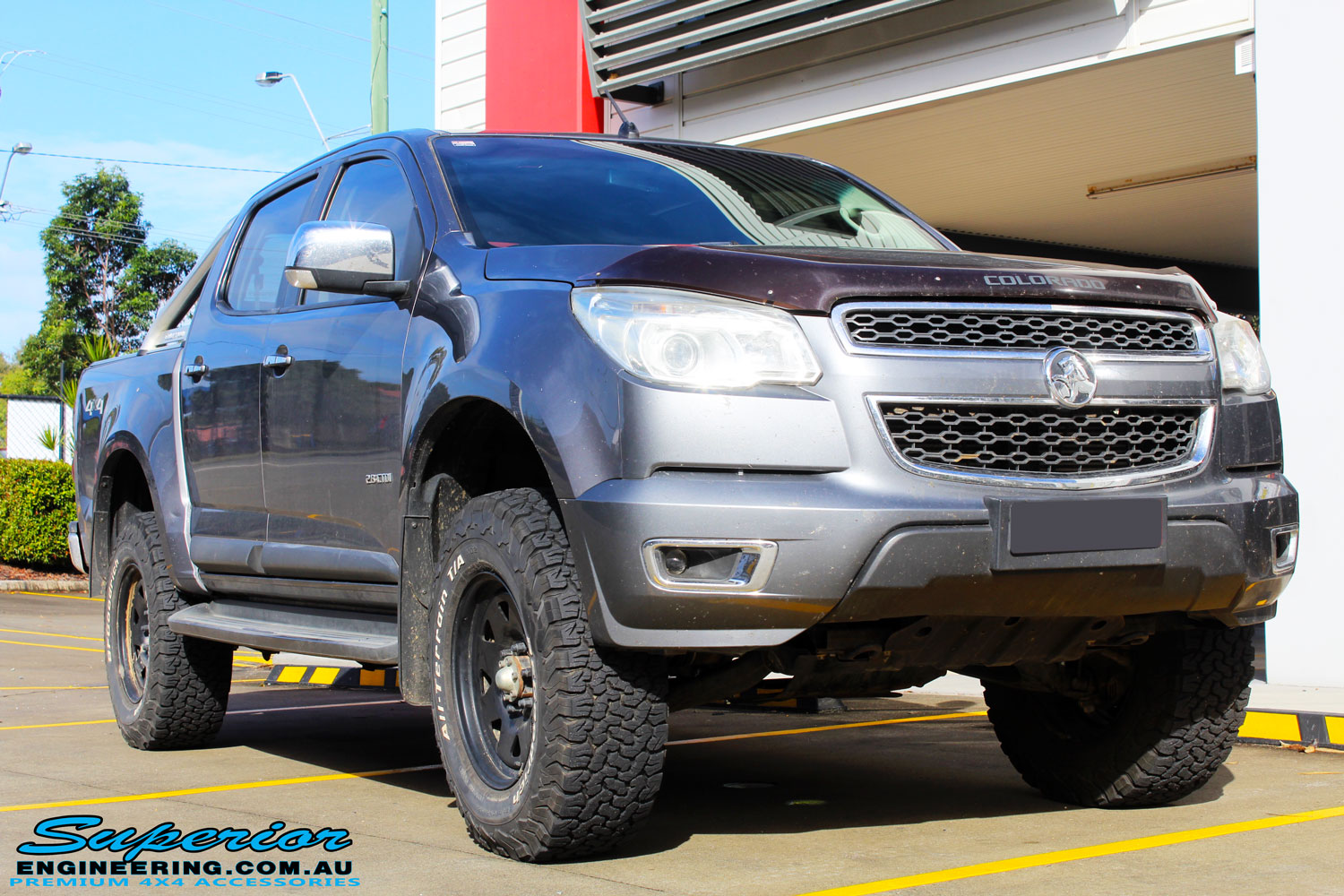 Right front side view of a Grey Holden RG Colorado Dual Cab after fitment of a Superior Nitro Gas 3" Inch Lift Kit