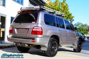 Rear right view of a Silver Toyota 100 Series Landcruiser before fitment of a 2" Inch Lift Kit with Airbags