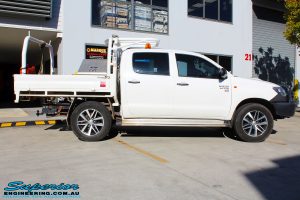 Right side view of a Toyota Vigo Hilux Dual Cab in White before fitment of a Superior Nitro Gas 2" Inch Lift Kit
