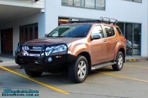 Left front side view of a Gold Isuzu MU-X Wagon after fitment of a Ironman 4x4 Roof Rack & Black Deluxe Bull Bar