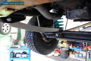 Front left underbody shot of the fitted Hybrid Superflex Radius Arm with Dobinson Coil Spring