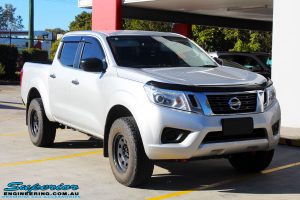 Right front side view of a Grey Nissan NP300 Navara Ute before fitment of a Superior Remote Reservoir 2" Inch Lift Kit + Ironman 4x4 Deluxe Black Bull Bar & Superior 2" Inch Body Lift