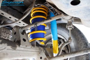 Rear left underbody inside view of the fitted Bilstein Shock, King Coil Spring + Airbag