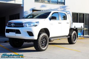 Left front side view of a Toyota Revo Hilux Dual Cab after fitment of Superior Upper Control Arms & a Diff Drop Kit