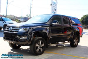 Left front side view of a Black Volkswagen Amarok Dual Cab after being fitted with a wide range of quality 4x4 Suspension and Accessories