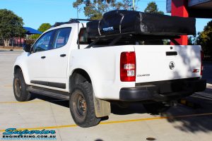 Rear right view of a White Holden RG Colorado Dual Cab after fitment of a Superior Nitro Gas 3" Inch Lift Kit