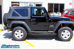 Right side view of a Black Jeep JK SWB after fitment of a Dobinson 50mm Lift Kit