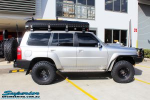 Right side view of a Nissan GU Patrol Wagon before fitment of a Airbag Man Coil Air Kit & Superior Drop Out Cones