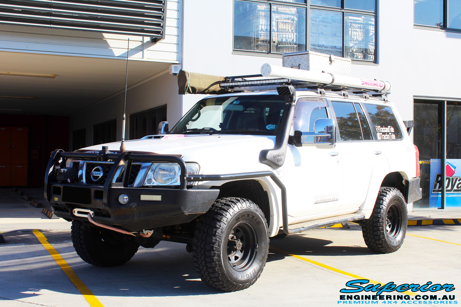 Front left side view of the Nissan GQ Patrol Wagon after fitment of a range of Suspension Components