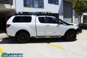Right side view of a Mazda BT50 Freestyle Cab in White before fitment of a Superior Nitro Gas 2" Inch Lift Kit