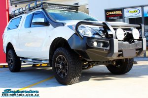 Right front side view of a Mazda BT50 Freestyle Cab in White before fitment of a Superior Nitro Gas 2" Inch Lift Kit