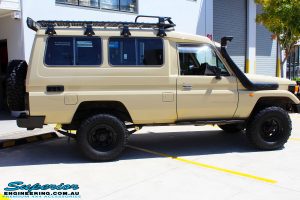 Right side view of a Beige Toyota 75 Series Landcruiser Troopcarrier after fitment of a EFS 2" Inch Lift Kit