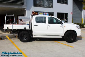 Right side view of a White Toyota Vigo Hilux before fitment of a MCC 4x4 Bullbar