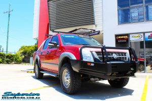 Right front side view of a Red Holden RA9 Rodeo after fitment of a Ironman 4x4 Black Commercial Bullbar